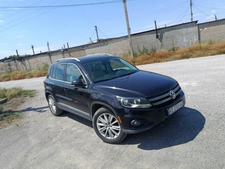 Черный Фольксваген Тигуан, объемом двигателя 2 л и пробегом 179 тыс. км за 11700 $, фото 1 на Automoto.ua