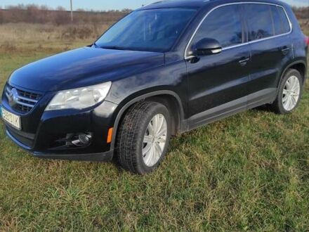 Черный Фольксваген Тигуан, объемом двигателя 2 л и пробегом 285 тыс. км за 9700 $, фото 1 на Automoto.ua