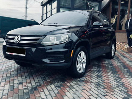 Чорний Фольксваген Тігуан, об'ємом двигуна 2 л та пробігом 160 тис. км за 9300 $, фото 1 на Automoto.ua