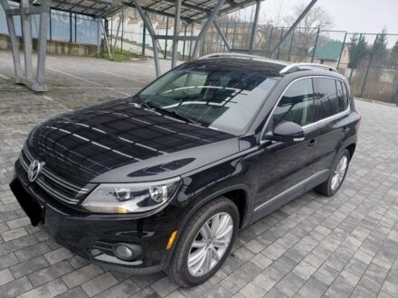 Чорний Фольксваген Тігуан, об'ємом двигуна 2 л та пробігом 259 тис. км за 8900 $, фото 1 на Automoto.ua
