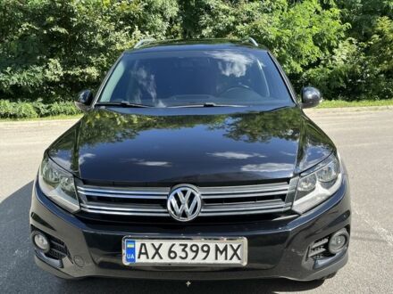 Чорний Фольксваген Тігуан, об'ємом двигуна 2 л та пробігом 176 тис. км за 12499 $, фото 1 на Automoto.ua