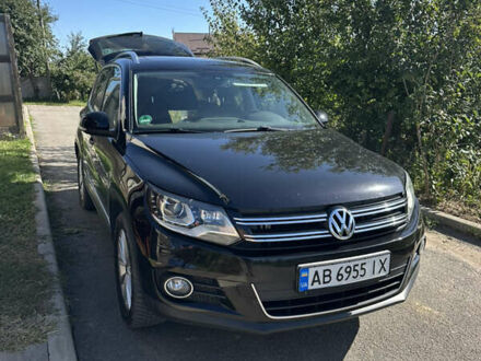 Чорний Фольксваген Тігуан, об'ємом двигуна 1.97 л та пробігом 231 тис. км за 15000 $, фото 1 на Automoto.ua