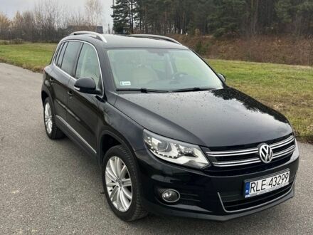 Черный Фольксваген Тигуан, объемом двигателя 2 л и пробегом 160 тыс. км за 7800 $, фото 1 на Automoto.ua