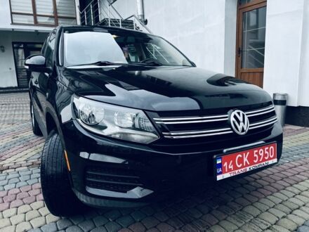 Черный Фольксваген Тигуан, объемом двигателя 2 л и пробегом 185 тыс. км за 9999 $, фото 1 на Automoto.ua