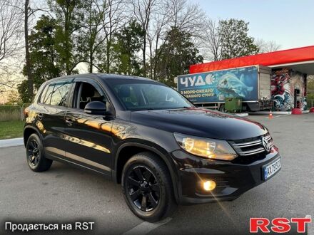 Чорний Фольксваген Тігуан, об'ємом двигуна 2 л та пробігом 181 тис. км за 9200 $, фото 1 на Automoto.ua