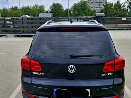 Чорний Фольксваген Тігуан, об'ємом двигуна 2 л та пробігом 225 тис. км за 10700 $, фото 1 на Automoto.ua