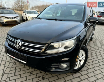 Чорний Фольксваген Тігуан, об'ємом двигуна 2 л та пробігом 256 тис. км за 7999 $, фото 1 на Automoto.ua