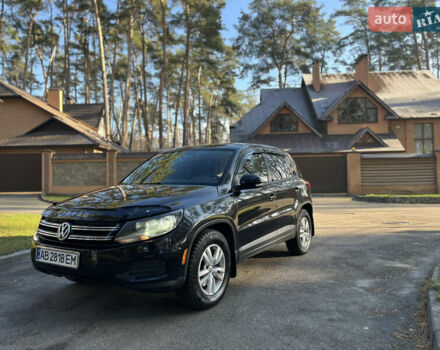 Черный Фольксваген Тигуан, объемом двигателя 2 л и пробегом 185 тыс. км за 11500 $, фото 1 на Automoto.ua