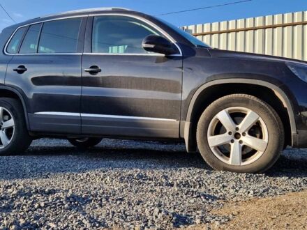 Чорний Фольксваген Тігуан, об'ємом двигуна 2 л та пробігом 140 тис. км за 15999 $, фото 1 на Automoto.ua