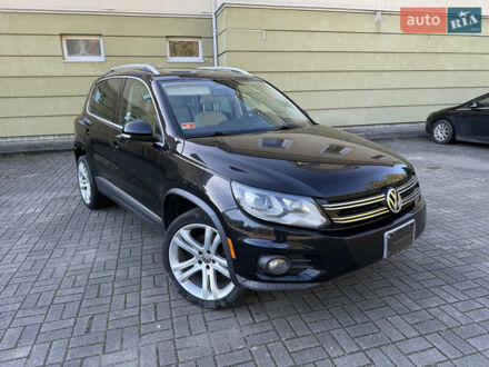 Чорний Фольксваген Тігуан, об'ємом двигуна 1.98 л та пробігом 106 тис. км за 10700 $, фото 1 на Automoto.ua