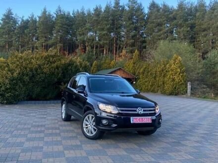 Чорний Фольксваген Тігуан, об'ємом двигуна 1.99 л та пробігом 180 тис. км за 11300 $, фото 1 на Automoto.ua