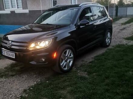 Черный Фольксваген Тигуан, объемом двигателя 1.98 л и пробегом 180 тыс. км за 11850 $, фото 1 на Automoto.ua