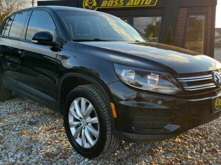 Чорний Фольксваген Тігуан, об'ємом двигуна 2 л та пробігом 200 тис. км за 10999 $, фото 1 на Automoto.ua