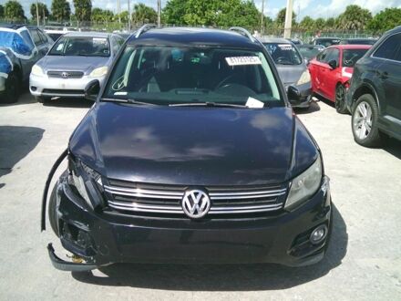 Чорний Фольксваген Тігуан, об'ємом двигуна 2 л та пробігом 156 тис. км за 7000 $, фото 1 на Automoto.ua