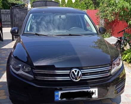 Чорний Фольксваген Тігуан, об'ємом двигуна 2 л та пробігом 200 тис. км за 12700 $, фото 1 на Automoto.ua