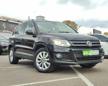 Чорний Фольксваген Тігуан, об'ємом двигуна 2 л та пробігом 150 тис. км за 18799 $, фото 1 на Automoto.ua