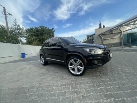 Чорний Фольксваген Тігуан, об'ємом двигуна 2 л та пробігом 246 тис. км за 9000 $, фото 1 на Automoto.ua