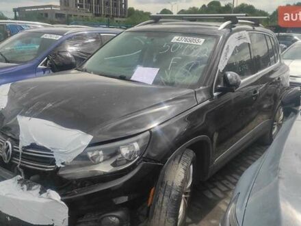 Чорний Фольксваген Тігуан, об'ємом двигуна 2 л та пробігом 210 тис. км за 7800 $, фото 1 на Automoto.ua