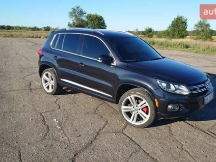 Черный Фольксваген Тигуан, объемом двигателя 2 л и пробегом 126 тыс. км за 14250 $, фото 1 на Automoto.ua