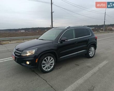Черный Фольксваген Тигуан, объемом двигателя 2 л и пробегом 172 тыс. км за 12000 $, фото 1 на Automoto.ua