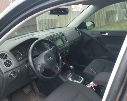 Чорний Фольксваген Тігуан, об'ємом двигуна 2 л та пробігом 340 тис. км за 14500 $, фото 1 на Automoto.ua