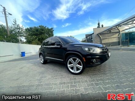 Чорний Фольксваген Тігуан, об'ємом двигуна 2 л та пробігом 246 тис. км за 9000 $, фото 1 на Automoto.ua