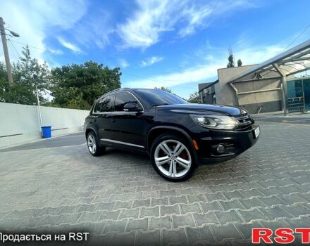Черный Фольксваген Тигуан, объемом двигателя 2 л и пробегом 246 тыс. км за 9000 $, фото 1 на Automoto.ua
