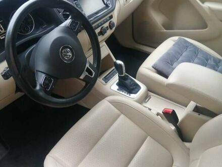 Черный Фольксваген Тигуан, объемом двигателя 2 л и пробегом 99 тыс. км за 15000 $, фото 1 на Automoto.ua