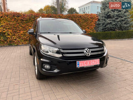 Чорний Фольксваген Тігуан, об'ємом двигуна 1.98 л та пробігом 174 тис. км за 12750 $, фото 1 на Automoto.ua