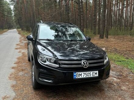 Черный Фольксваген Тигуан, объемом двигателя 2 л и пробегом 240 тыс. км за 12200 $, фото 1 на Automoto.ua