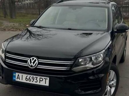 Чорний Фольксваген Тігуан, об'ємом двигуна 2 л та пробігом 175 тис. км за 11700 $, фото 1 на Automoto.ua