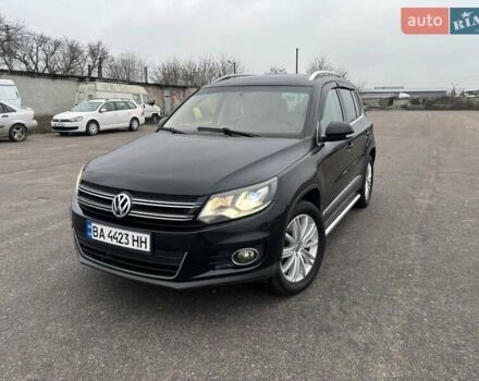Чорний Фольксваген Тігуан, об'ємом двигуна 2 л та пробігом 126 тис. км за 14200 $, фото 1 на Automoto.ua