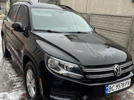 Чорний Фольксваген Тігуан, об'ємом двигуна 2 л та пробігом 171 тис. км за 11111 $, фото 1 на Automoto.ua