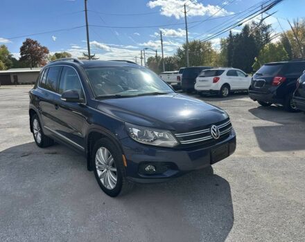 Чорний Фольксваген Тігуан, об'ємом двигуна 2 л та пробігом 80 тис. км за 5800 $, фото 1 на Automoto.ua