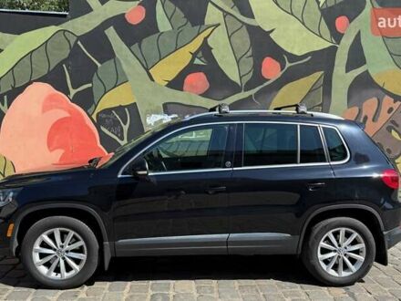 Чорний Фольксваген Тігуан, об'ємом двигуна 1.98 л та пробігом 119 тис. км за 14500 $, фото 1 на Automoto.ua