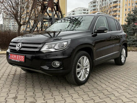Чорний Фольксваген Тігуан, об'ємом двигуна 2 л та пробігом 123 тис. км за 14999 $, фото 1 на Automoto.ua