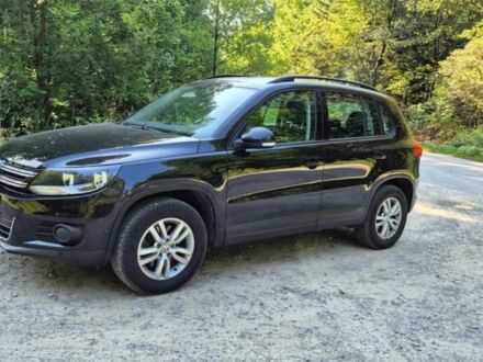 Чорний Фольксваген Тігуан, об'ємом двигуна 2 л та пробігом 156 тис. км за 8200 $, фото 1 на Automoto.ua