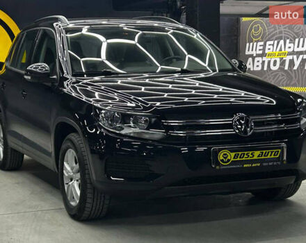 Чорний Фольксваген Тігуан, об'ємом двигуна 2 л та пробігом 133 тис. км за 13900 $, фото 1 на Automoto.ua