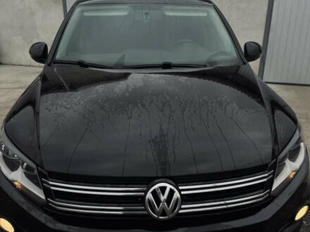 Чорний Фольксваген Тігуан, об'ємом двигуна 1.98 л та пробігом 210 тис. км за 11400 $, фото 1 на Automoto.ua