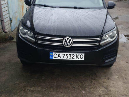 Чорний Фольксваген Тігуан, об'ємом двигуна 1.98 л та пробігом 107 тис. км за 15000 $, фото 1 на Automoto.ua