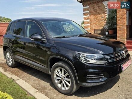 Чорний Фольксваген Тігуан, об'ємом двигуна 2 л та пробігом 217 тис. км за 11950 $, фото 1 на Automoto.ua