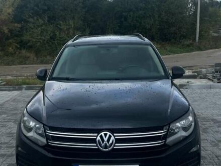 Чорний Фольксваген Тігуан, об'ємом двигуна 2 л та пробігом 114 тис. км за 15000 $, фото 1 на Automoto.ua