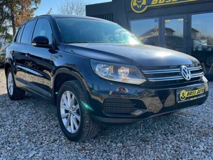 Чорний Фольксваген Тігуан, об'ємом двигуна 2 л та пробігом 142 тис. км за 12200 $, фото 1 на Automoto.ua