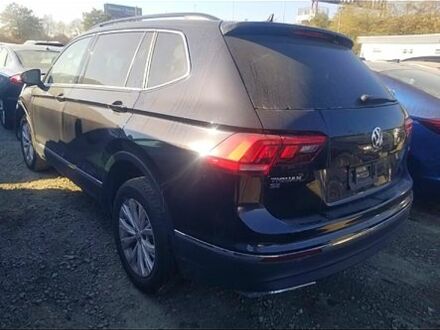 Черный Фольксваген Тигуан, объемом двигателя 2 л и пробегом 100 тыс. км за 9000 $, фото 1 на Automoto.ua