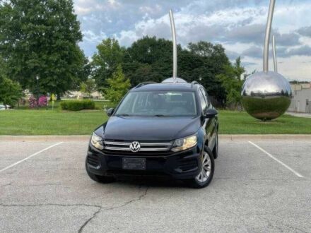 Чорний Фольксваген Тігуан, об'ємом двигуна 2 л та пробігом 123 тис. км за 3200 $, фото 1 на Automoto.ua