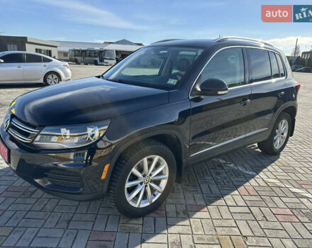 Черный Фольксваген Тигуан, объемом двигателя 2 л и пробегом 100 тыс. км за 14200 $, фото 1 на Automoto.ua