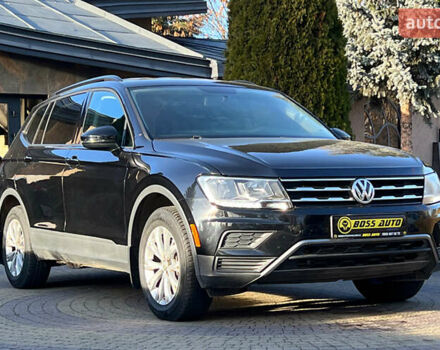 Чорний Фольксваген Тігуан, об'ємом двигуна 1.98 л та пробігом 201 тис. км за 15999 $, фото 1 на Automoto.ua