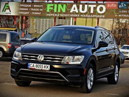 Черный Фольксваген Тигуан, объемом двигателя 1.98 л и пробегом 155 тыс. км за 18800 $, фото 1 на Automoto.ua