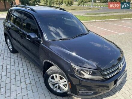 Чорний Фольксваген Тігуан, об'ємом двигуна 1.98 л та пробігом 218 тис. км за 12800 $, фото 1 на Automoto.ua