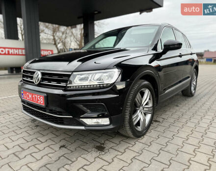 Чорний Фольксваген Тігуан, об'ємом двигуна 1.98 л та пробігом 151 тис. км за 24900 $, фото 1 на Automoto.ua